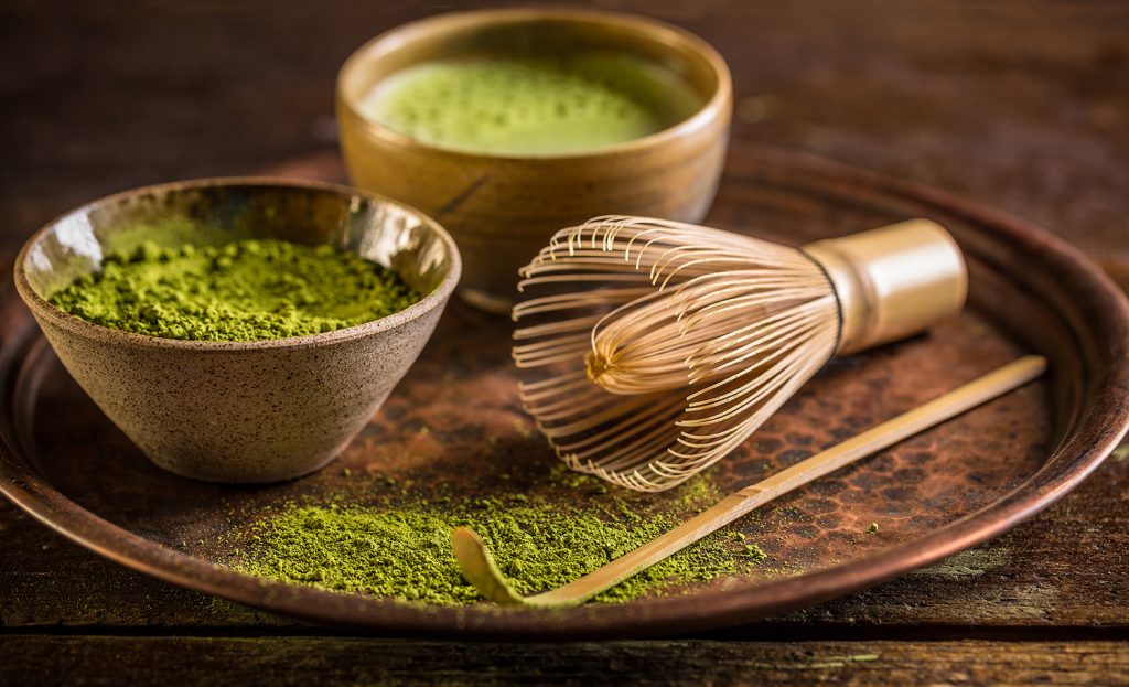 Healthy green matcha tea in bowl